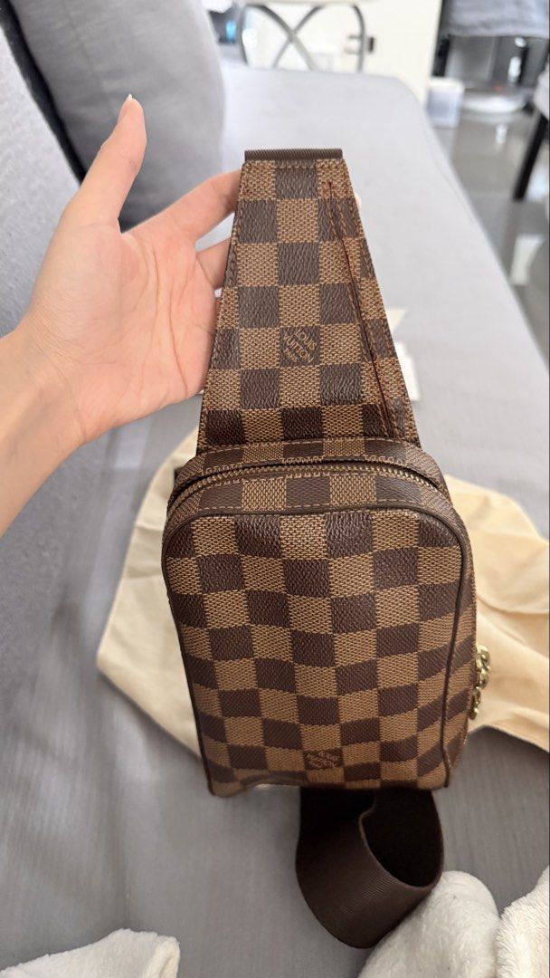 Louis Vuitton Damier Ebene Canvas Geronimo Sling Bag (Category: Luxury Bags & Wallets) located in Manila. Submitted by immelizza (Listing ID 1451197459, Image 2). Description: - Authentic Louis Vuitton sling bag - Damier Ebene canvas with classic checkered pattern - Adjustable strap with gold buckle - Small interior pocket - Ideal for everyday use - Comes with original dust bag HAVE ENTRUPY Bought from purse maison - can meet up where you can get