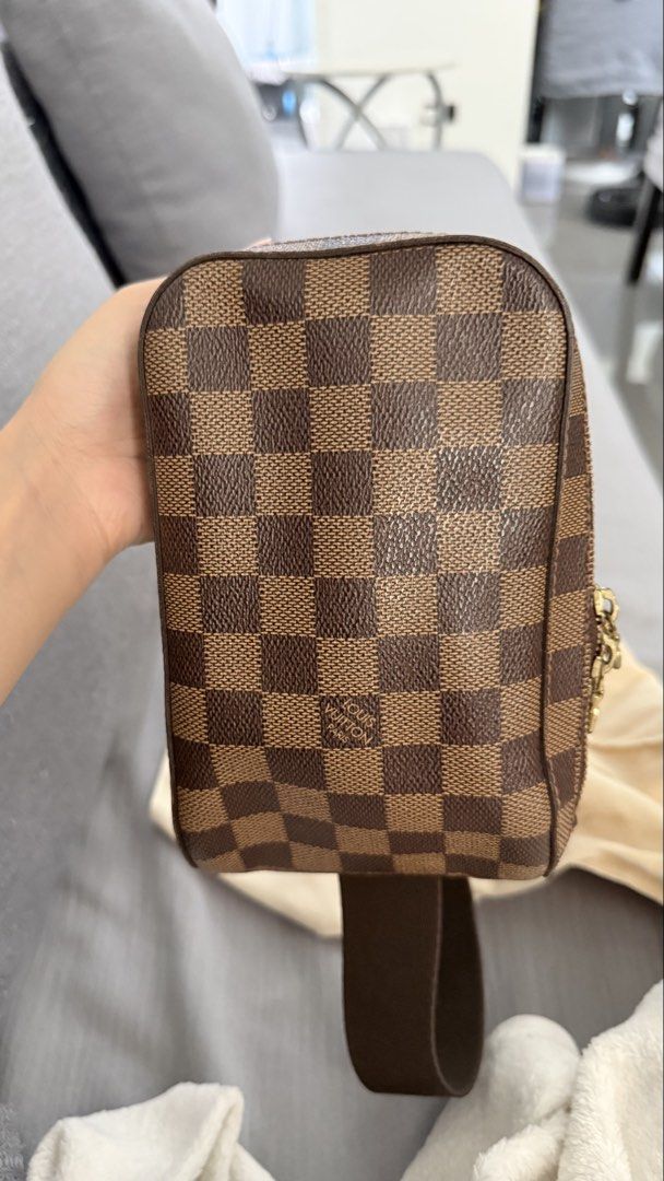 Louis Vuitton Damier Ebene Canvas Geronimo Sling Bag (Category: Luxury Bags & Wallets) located in Manila. Submitted by immelizza (Listing ID 1451197459, Image 3). Description: - Authentic Louis Vuitton sling bag - Damier Ebene canvas with classic checkered pattern - Adjustable strap with gold buckle - Small interior pocket - Ideal for everyday use - Comes with original dust bag HAVE ENTRUPY Bought from purse maison - can meet up where you can get