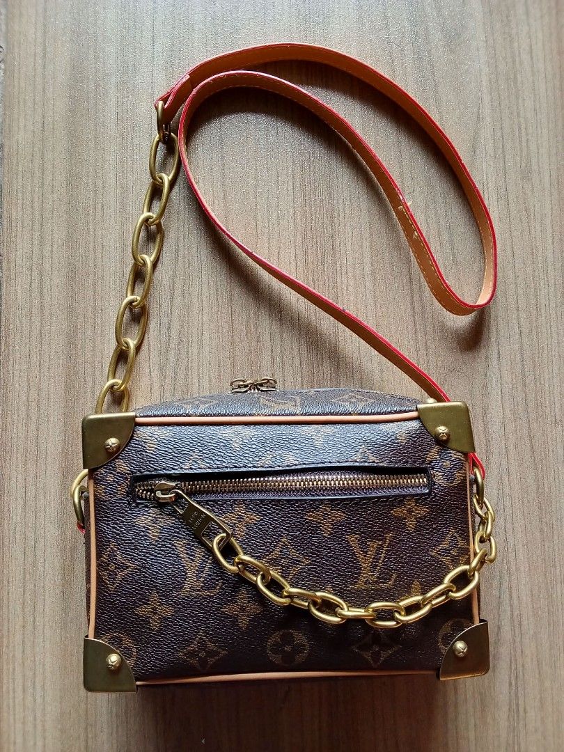 Louis Vuitton Monogram Trunk Bag (Category: Luxury Bags & Wallets) located in Manila. Submitted by cosmiccloud-9236 (Listing ID 1451136274, Image 1). Description: - Classic Louis Vuitton monogram trunk bag - Features a gold chain strap - Accented with leather details - Interior is clean and well-maintained - A true statement piece for any fashion-forward individual - Ideal for evening events or adding a touch of luxury to your everyday style - Co