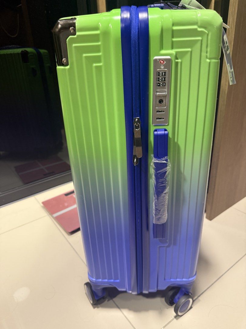 Luggage Suitcase (Category: Luggages) located in Kuala Lumpur. Submitted by pxwerpow (Listing ID 1451315586, Image 2). Description: - GIOR Z luggage with stylish ombre effect - Features a TSA lock for security - Smooth maneuverability with four spinner wheels - Perfect for your next trip!.