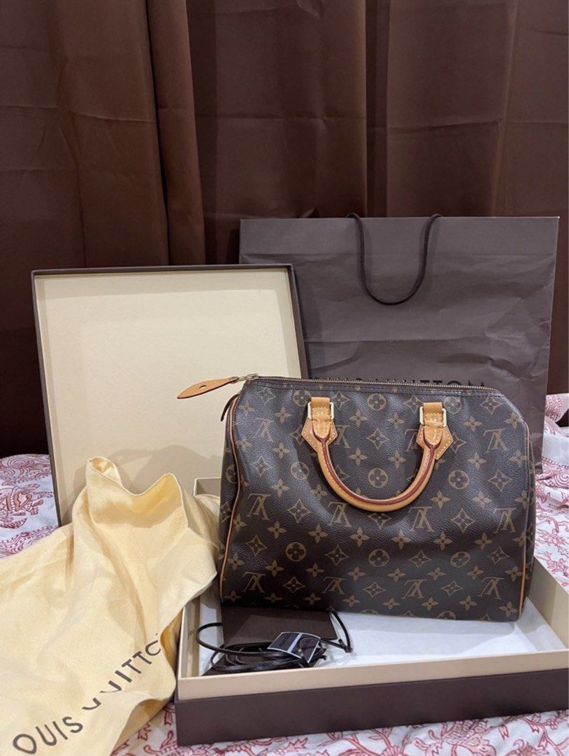 LV Louis Vuitton Speedy 30 Monogram Canvas (Category: Luxury Bags & Wallets) located in Cainta. Submitted by rsshopacc (Listing ID 1451152060, Image 2). Description: LV Louis Vuitton Speedy 30 Monogram Canvas AUTHENTIC - money back guarantee Perfect for gifting. Lightly used, just carefully kept. Actual photos posted with inclusions. Complete Inclusions: - tags - dustbag -box - paper bag - lock and key - receipt of purchase (pm for details) Purch