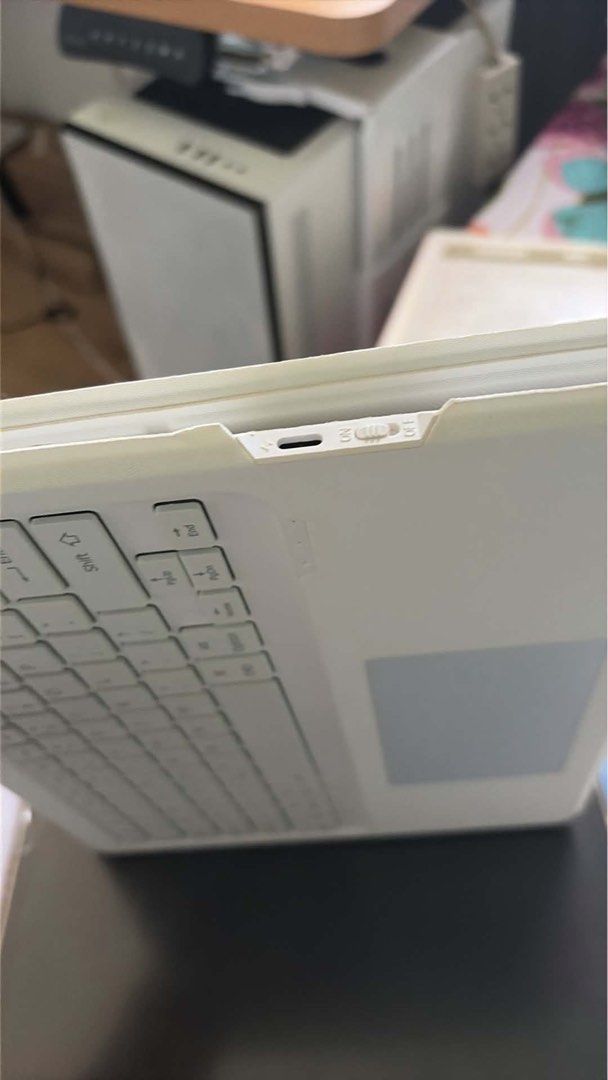 Magic Keyboard case for Ipad air 13 inch M2 (Category: Laptop Bags & Sleeves) located in Capas. Submitted by marianneestrella (Listing ID 1451161810, Image 1). Description: Slight disclororation on the body, keyboard is functioning well, Bluetooth connection, detachable ipad case. rotating function.
