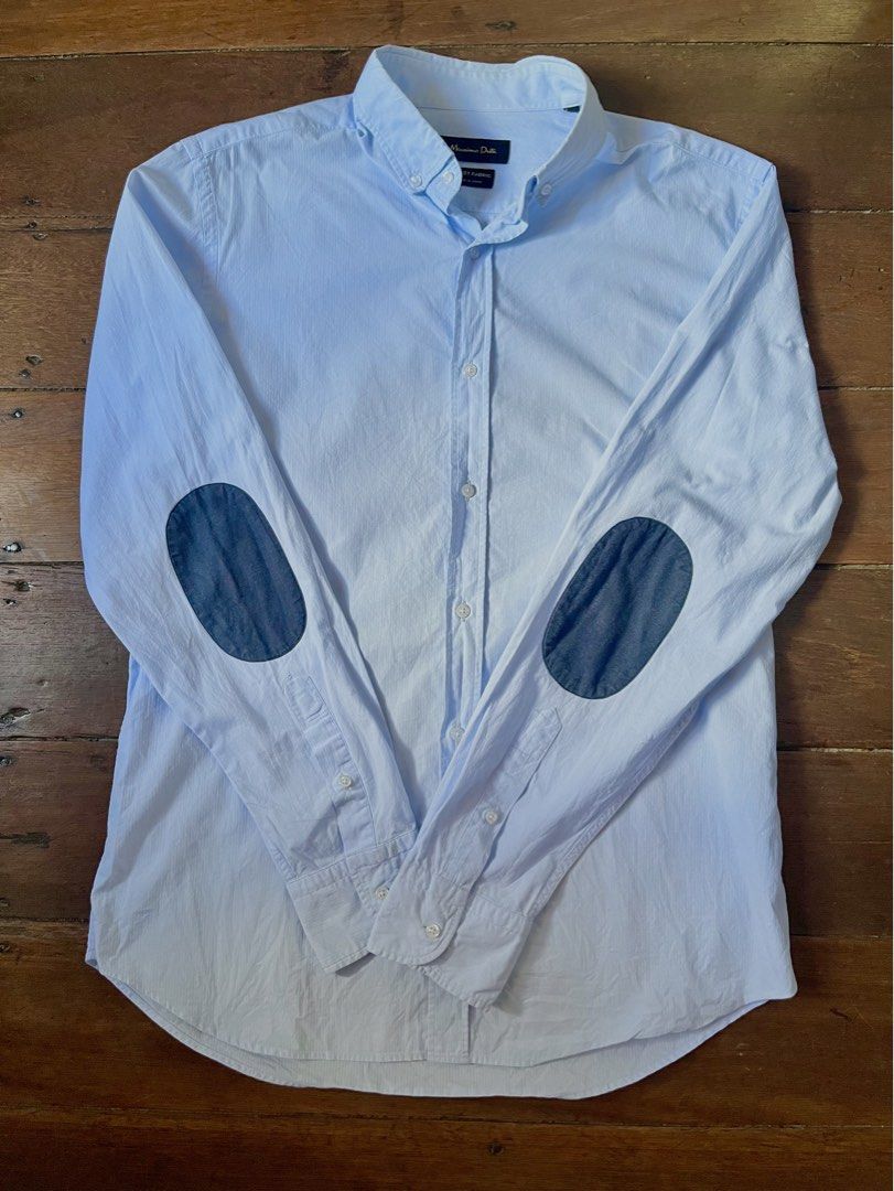 Massimo Dutti Light Blue Button-Down Shirt w/ Navy Elbow Patches (Category: Formal Shirts) located in Lipa City. Submitted by coolthreadss (Listing ID 1450813228, Image 2). Description: Brand: Massimo Dutti Color: Light Blue / Sky Blue (with Navy Elbow Patches) Style: Long-sleeve button-down shirt Features: Distinctive elbow patch accents, button-down collar, textured fabric woven finish Condition: Pre-owned in great condition. (Clean fabric with