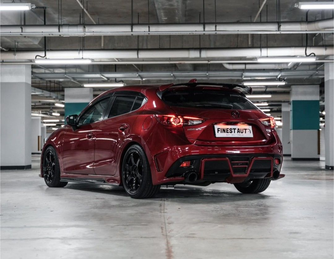 Mazda 3 Hatchback 2.0 (A) (Category: Used Cars) located in Singapore. Submitted by lobangking1818 (Listing ID 1430278630, Image 3). Description: Rare 2.0L Skyactiv Engine Hatchback variant, paired with renowned Mazda Skyactiv 6AT. custom forged carbon steering wheel paddle shifter 1 pair of SSCUS Bucket Seats TE37 18" Rims Brembo Big Brake Kit Soul Red Paintwork Knightsport Bodykit Very well taken care of, meticulously maintained, many crucial we