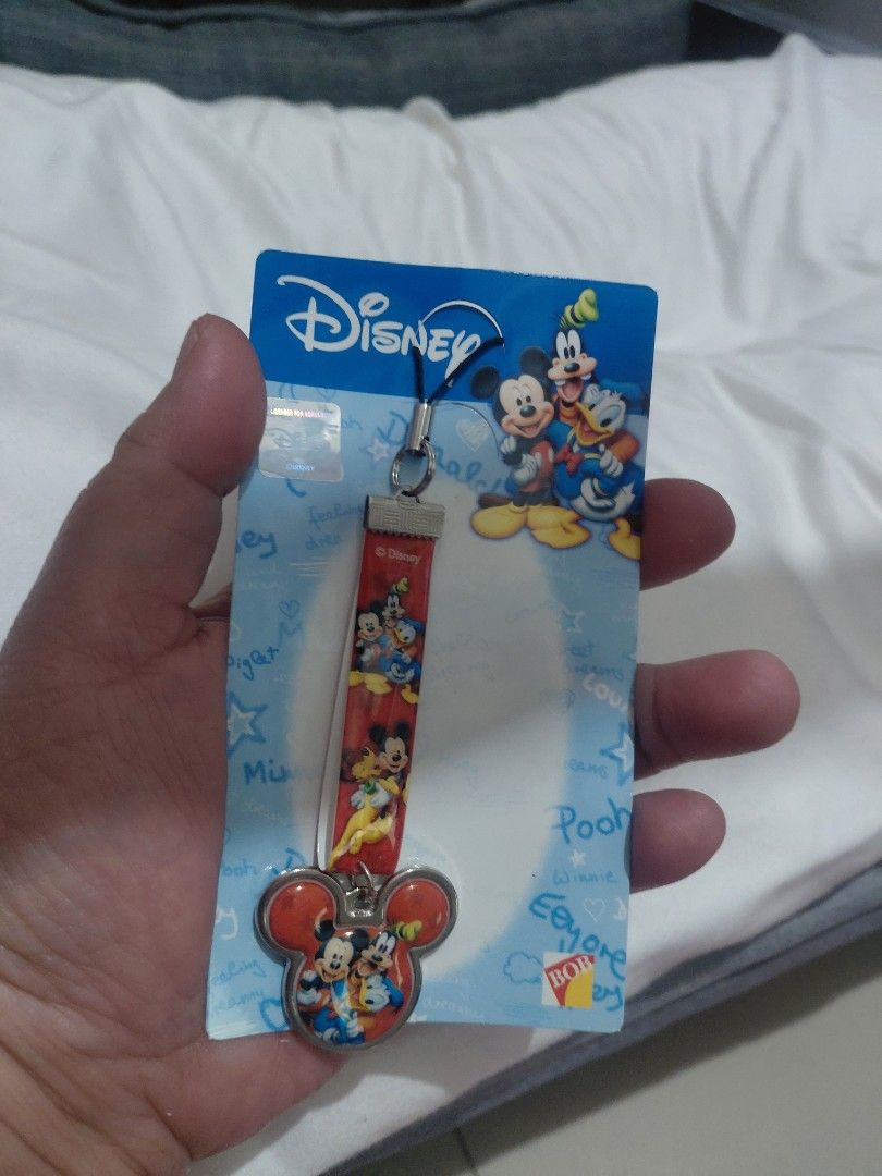MICKEY MOUSE KEYCHAIN DISNEY (Category: Character Goods) located in Manila. Submitted by bashamylove0116 (Listing ID 1451298912, Image 1). Description: Mickey Mouse keychain DISNEY.