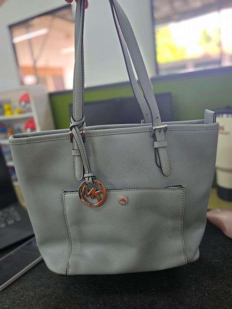 MK Jetset Tote (Category: Tote Bags) located in Talisay. Submitted by tinkerbellaaaa (Listing ID 1451155310, Image 2). Description: preowned mk jetset tote in light blue. issue : with minor storage marks see last photo, naka stock lang sa cabinet but super clean inside. super clean hardware..