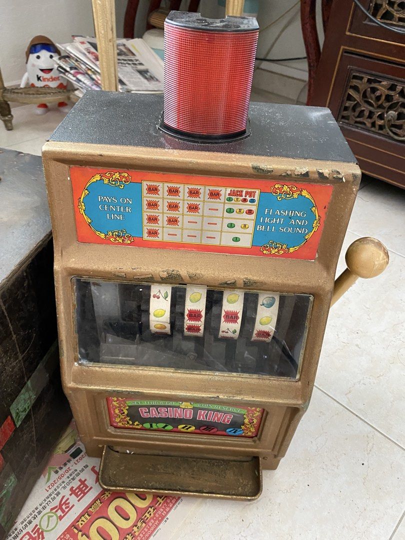 Multiple item (Category: Vintage Collectibles) located in Singapore. Submitted by yurit1 (Listing ID 1451323899, Image 1). Description: Antique Jackpot machine(spoil)-$60.New Zealand green cute display-$50.Peanut shaped cabinet -$220.Spartan Display Armour -$180.Vintage Embroidery Chines Dragon design-$10 each.Porcelain plate with wooden stand -$170.Paper drawing -$60..