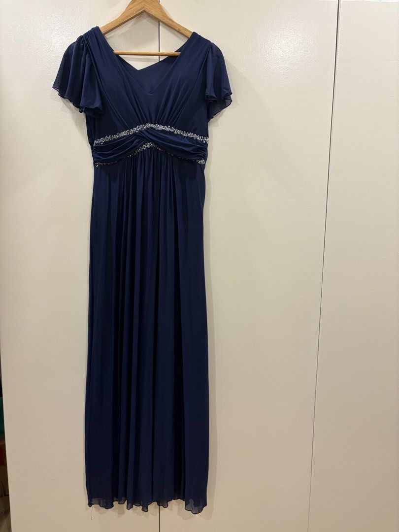 Navy Blue Gown with Beaded Waist (Category: Dresses) located in Paranaque City. Submitted by macabelli (Listing ID 1451243714, Image 2). Description: - Navy blue gown / maxi dress - Flutter sleeves - V-neckline, - Ruched, beaded waistband - Flowy, floor-length skirt - Side zipper closure - Ideal for formal events and parties, prom, debut, wedding - Minimal flaws.