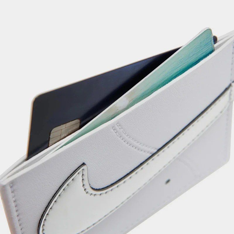 Nike Air Force 1 Card Wallet White (Category: Wallets & Card Holders) located in Angeles City. Submitted by 4sureph (Listing ID 1451203147, Image 3). Description: - White Nike Air Force 1 Card Wallet - Design inspired by the iconic shoe - Features two sleeves and one slot for cards, cash, and ID - Perfect for organizing your essentials - Comes in original packaging.
