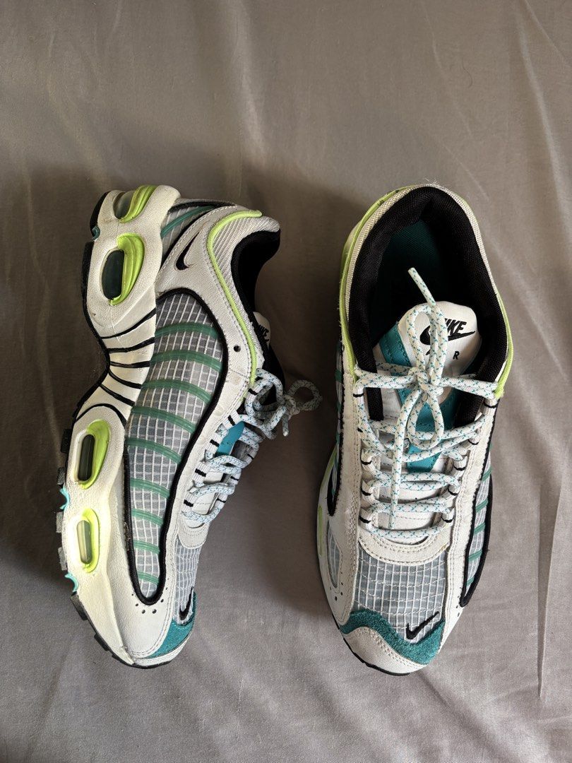 Nike Air Max Tailwind IV Sneakers (Category: Sneakers) located in Pasig City. Submitted by functionalrags (Listing ID 1451150642, Image 1). Description: - Nike Air Max Tailwind IV - Colorway: White, Teal, Lime Green - Upper: Mesh and Leather - Sole: Visible Air units - Style: Great for running or casual wear - Laces: Light blue and white pattern.