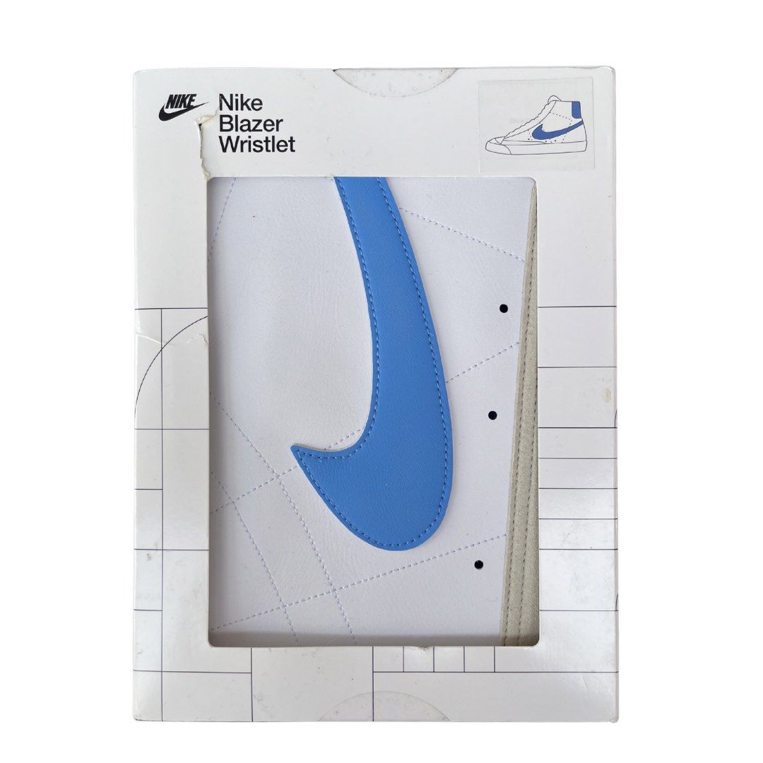 Nike Blazer Wristlet Pouch (Category: Purses & Pouches) located in Angeles City. Submitted by 4sureph (Listing ID 1451203931, Image 1). Description: - White and blue Nike wristlet - Inspired by the classic Blazer shoe design - Zipper closure with an interior slot - Can hold phones and small essentials - Includes a detachable wrist strap - Ideal for carrying daily necessities.
