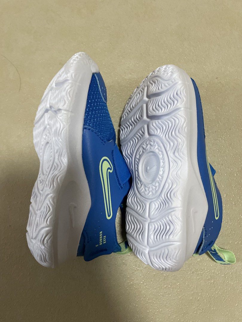 Nike Flex Runner 3 Toddler Shoes Blue (Category: Babies & Kids Fashion) located in Quezon City. Submitted by declutter-jen (Listing ID 1451262900, Image 3). Description: - Blue Nike Flex Runner 3 shoes for toddlers - Size 6C, Euro 22 - Easy slip-on design with hook-and-loop strap - Features a light green Nike swoosh and heel tab - Durable sole with excellent grip pattern - Ideal for active toddlers.