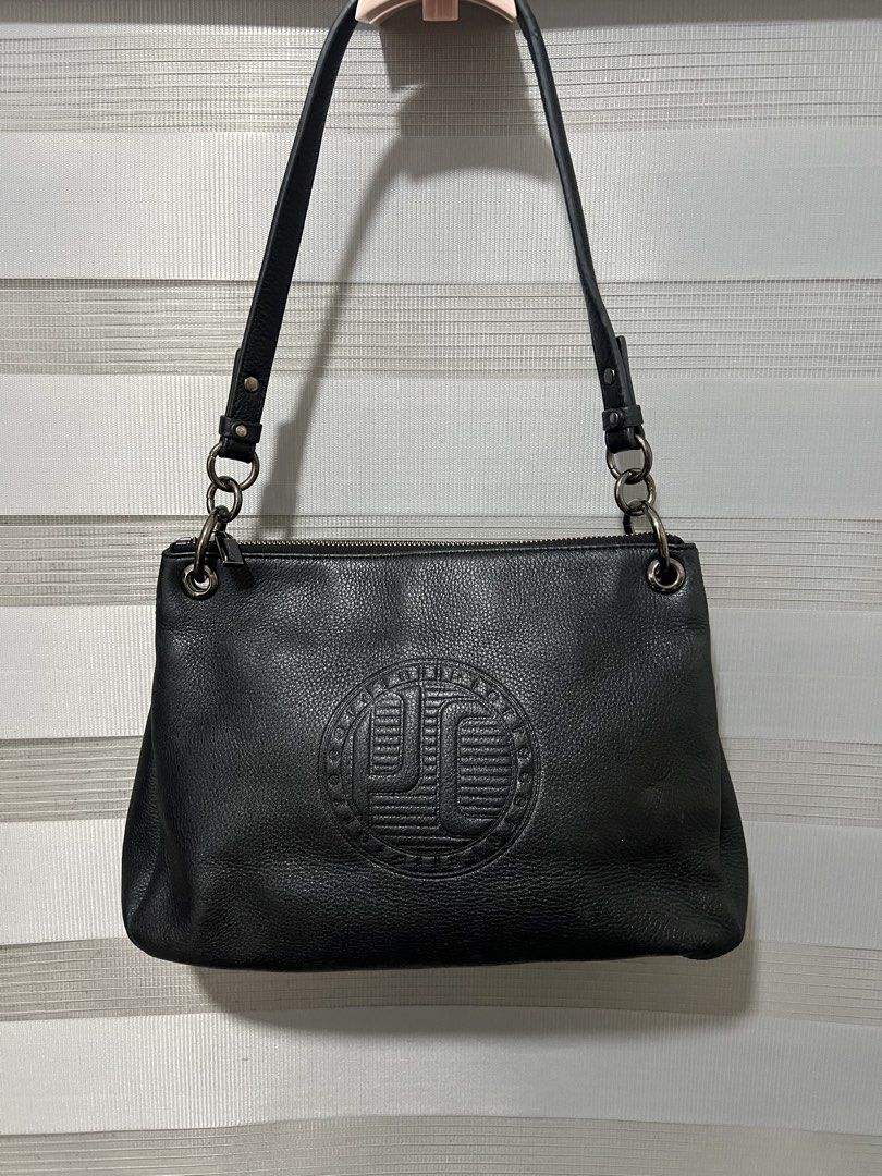 Pierre Cardin Black Leather Shoulder Bag (Category: Shoulder Bags) located in Las Pinas. Submitted by maple0305 (Listing ID 1451258038, Image 1). Description: - Authentic Pierre Cardin black leather shoulder bag - Textured leather with embossed logo detail - Secure zip closure - Silver-tone hardware - Interior zip pocket and branded lining - Ideal for everyday wear.