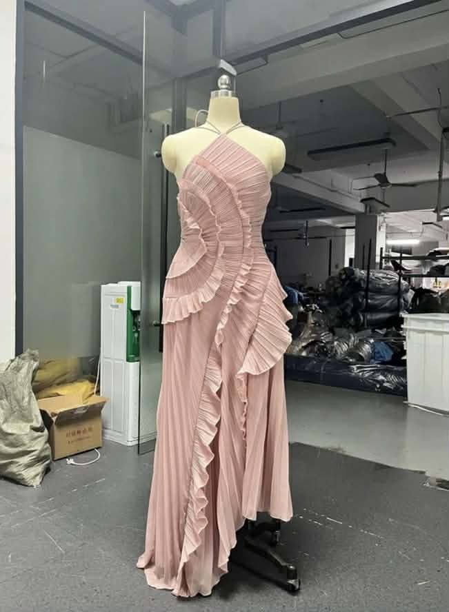 Pink Pleated Halter Neck Ruffle Dress (Category: Dresses) located in Cebu City. Submitted by ibyang_blgn (Listing ID 1451246434, Image 1). Description: - Beautiful pink pleated dress - Flattering halter neck with ruched bodice - Cascading ruffles down the front - Modern asymmetrical hemline - Ideal for special occasions or a night out - Comfortable and chic design.