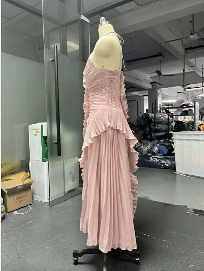 Pink Pleated Halter Neck Ruffle Dress (Category: Dresses) located in Cebu City. Submitted by ibyang_blgn (Listing ID 1451246434, Image 2). Description: - Beautiful pink pleated dress - Flattering halter neck with ruched bodice - Cascading ruffles down the front - Modern asymmetrical hemline - Ideal for special occasions or a night out - Comfortable and chic design.