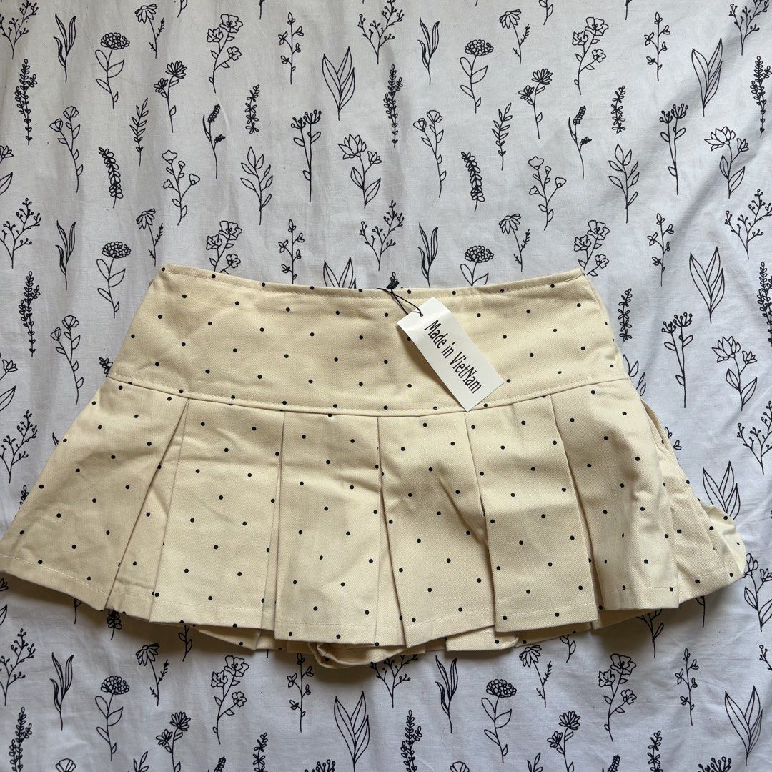 Polka Dots Mini Skirt (Category: Skirts) located in Rizal. Submitted by _notkendall (Listing ID 1451164361, Image 1). Description: ufs | lfb Polka Dots Skirt - super cute in person - color in person may pagka white/khaki siya - never been used / brand new / na fit lang - from Vietnam - can fit small to medium - highwaisted - 28.3 inches waistline super worth it talaga siya kasi ang ga ganda ng fabric ng vietnam clothing 😭🥹 rfs : di siya kasya s