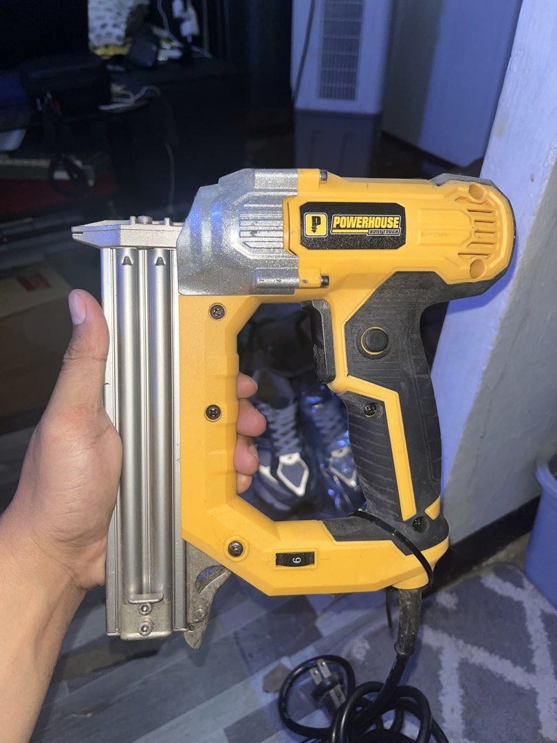 Powerhouse Electric Nail Gun (Category: Construction Tools & Equipment) located in Rizal. Submitted by kalakals.ph (Listing ID 1451183346, Image 2). Description: 3 times lang nagamit tapos tambak na. - Powerhouse brand electric nail gun - Color: Yellow and Black - Type: Corded Electric - Condition: Looks to be in good working order - Ideal for DIY or professional projects Used - like new.