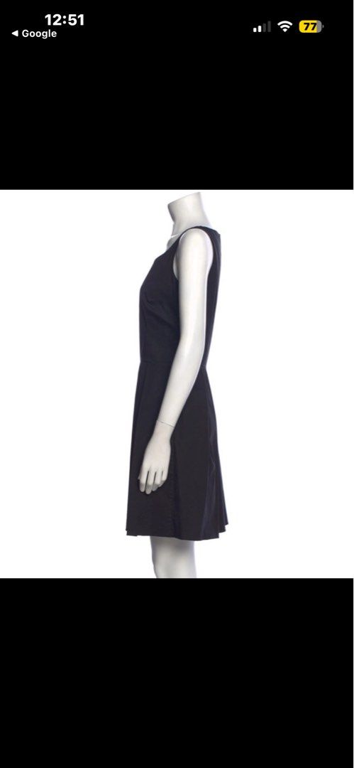 Prada Black Sleeveless Pleated Dress (Category: Dresses) located in Manila. Submitted by collect__ph (Listing ID 1451176874, Image 2). Description: - Classic black Prada dress - Sleeveless design - Flattering A-line skirt - Subtle pleating at the waist for volume - Versatile for dressing up or down - Zipper closure at the back - Made in Italy.