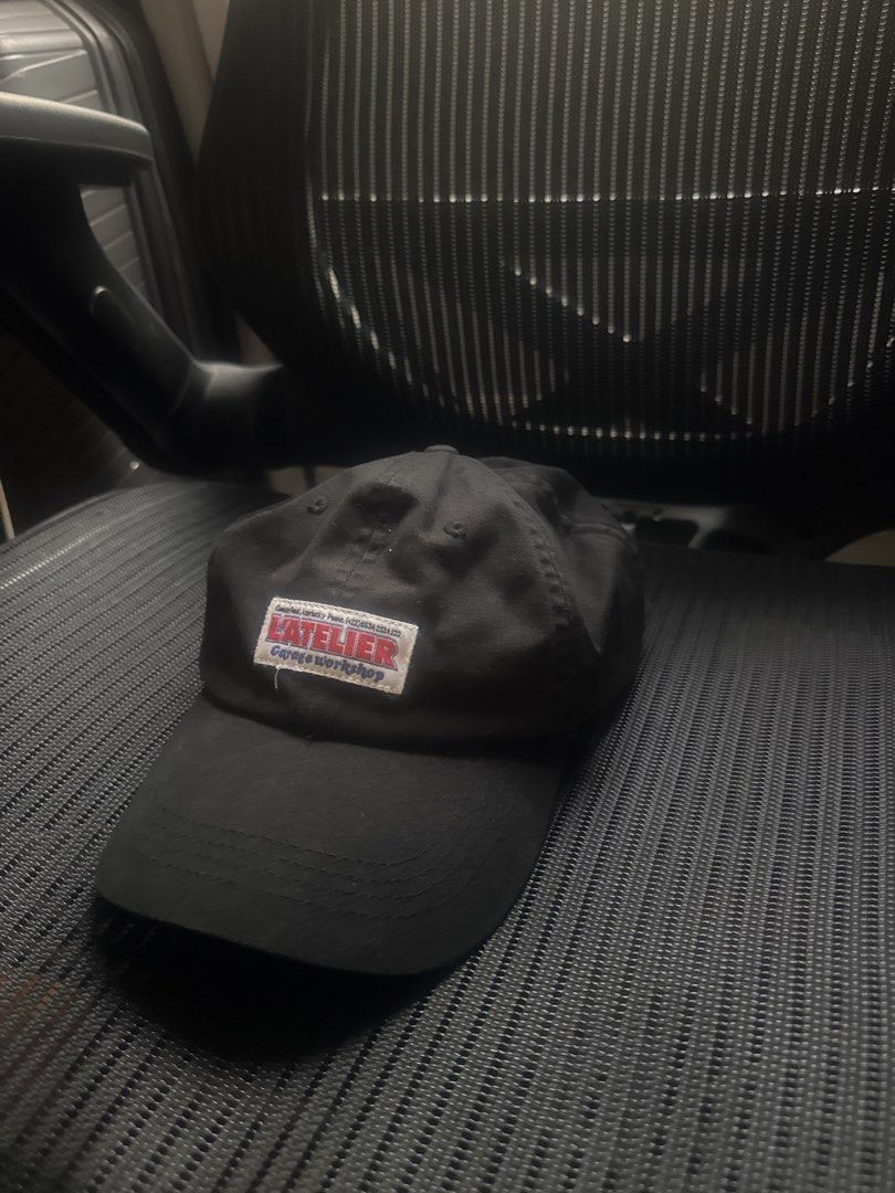 Pull&Bear Black L'Atelier Cap (Category: Caps & Hats) located in Manila. Submitted by eboryte (Listing ID 1451228891, Image 1). Description: - Classic black baseball cap style. - Features a prominent embroidered patch on the front. - Patch details: 'ATELIER' in red and white lettering with smaller text below. - Ideal for casual, everyday outfits..