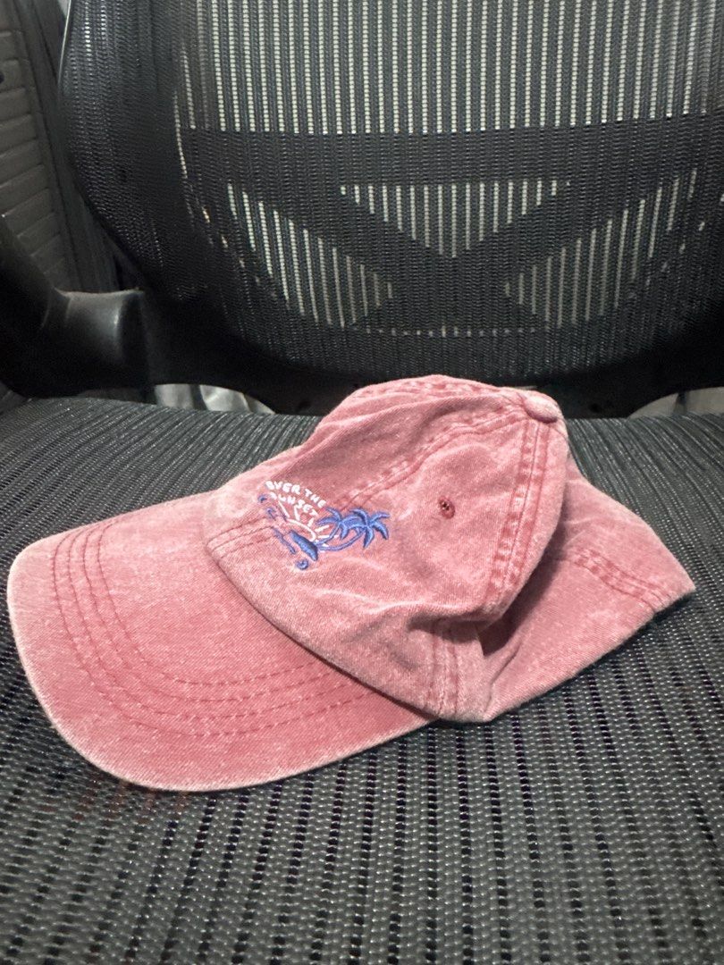 Pull&Bear Red Acid Washed Cap (Category: Caps & Hats) located in Manila. Submitted by eboryte (Listing ID 1451227305, Image 2). Description: - Washed red baseball cap - Blue embroidered palm tree and waves design - "Over the waves" embroidered text - Adjustable strap for a custom fit - Ideal for casual wear or a beach aesthetic.
