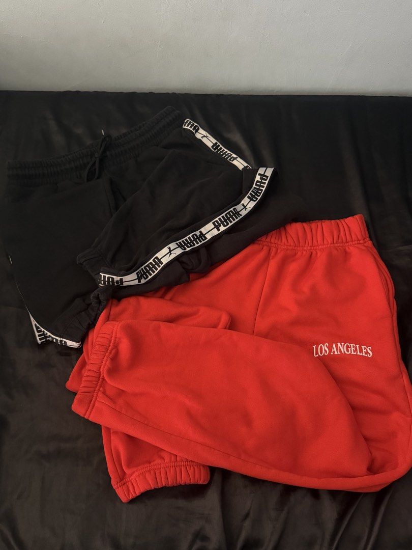 Puma Joggers & Los Angeles Sweatpants Bundle (Category: Joggers) located in San Mateo. Submitted by salvekamik84781 (Listing ID 1451170604, Image 1). Description: - Bundle of four pants (help me to declutter my clothes) - Black Puma joggers with side logo tape (color may vary due to lighting) - Red sweatpants with 'Los Angeles' embroidery - Free Black pants with elastic waistbands and drawstrings (left pocket flaw) - Another free red oversized pa