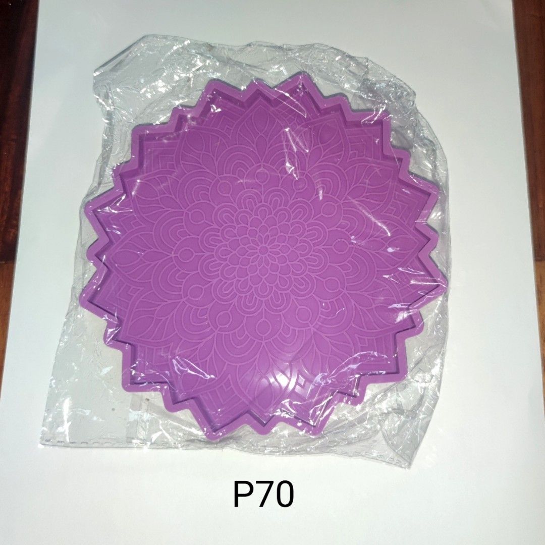Purple Mandala Silicone Mold for Baking or Crafts (Category: Bakeware) located in Muntinlupa City. Submitted by angeline_cga (Listing ID 1451151983, Image 1). Description: - Brand new purple silicone mold with a beautiful mandala design. - Versatile use: Ideal for baking cakes, making soaps, or for resin crafts. - Features an intricate mandala pattern for unique creations. - Comes in its original packaging. - Easy to use and clean for hassle-free