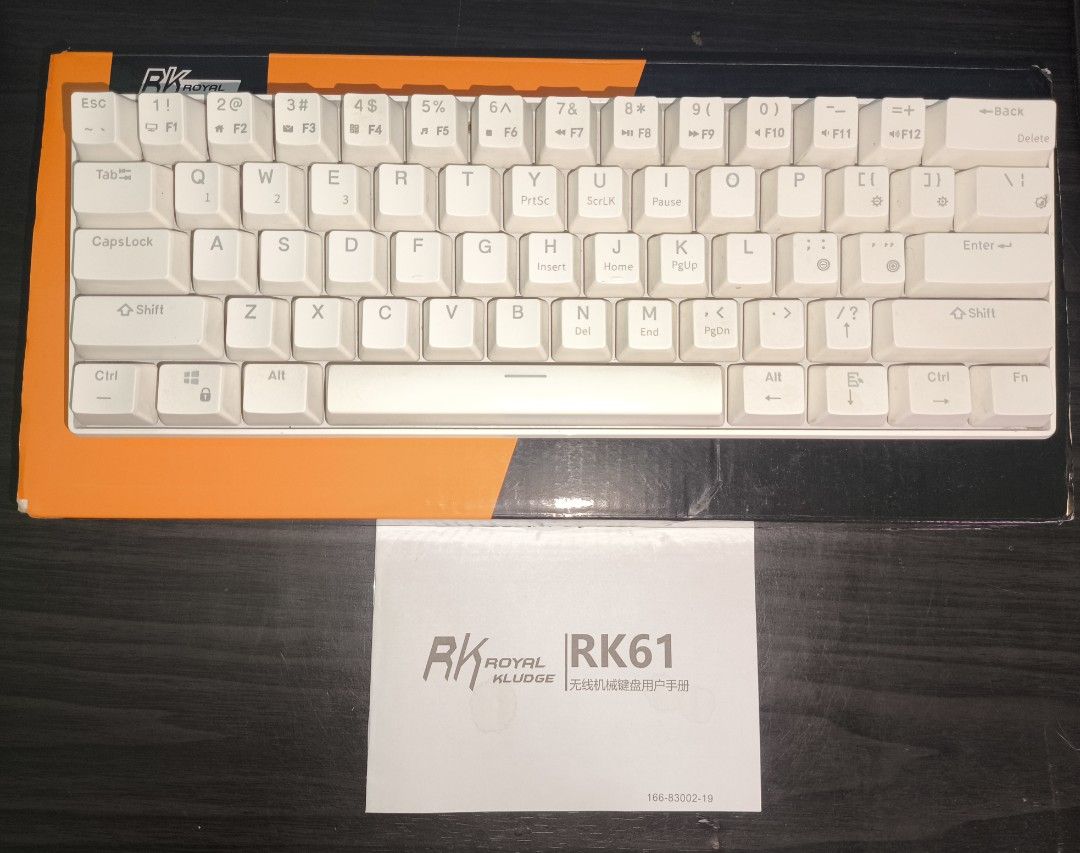 RK61 TRI MODE (Category: Computer Keyboard) located in Las Pinas. Submitted by jeyygrc (Listing ID 1451183109, Image 3). Description: ISSUE AGAD - can be only used as wired, degraded battery. MODS: - white tapes - plastic white bubble wrap Stock Brown Switches 📍 BF INT'L CAA.