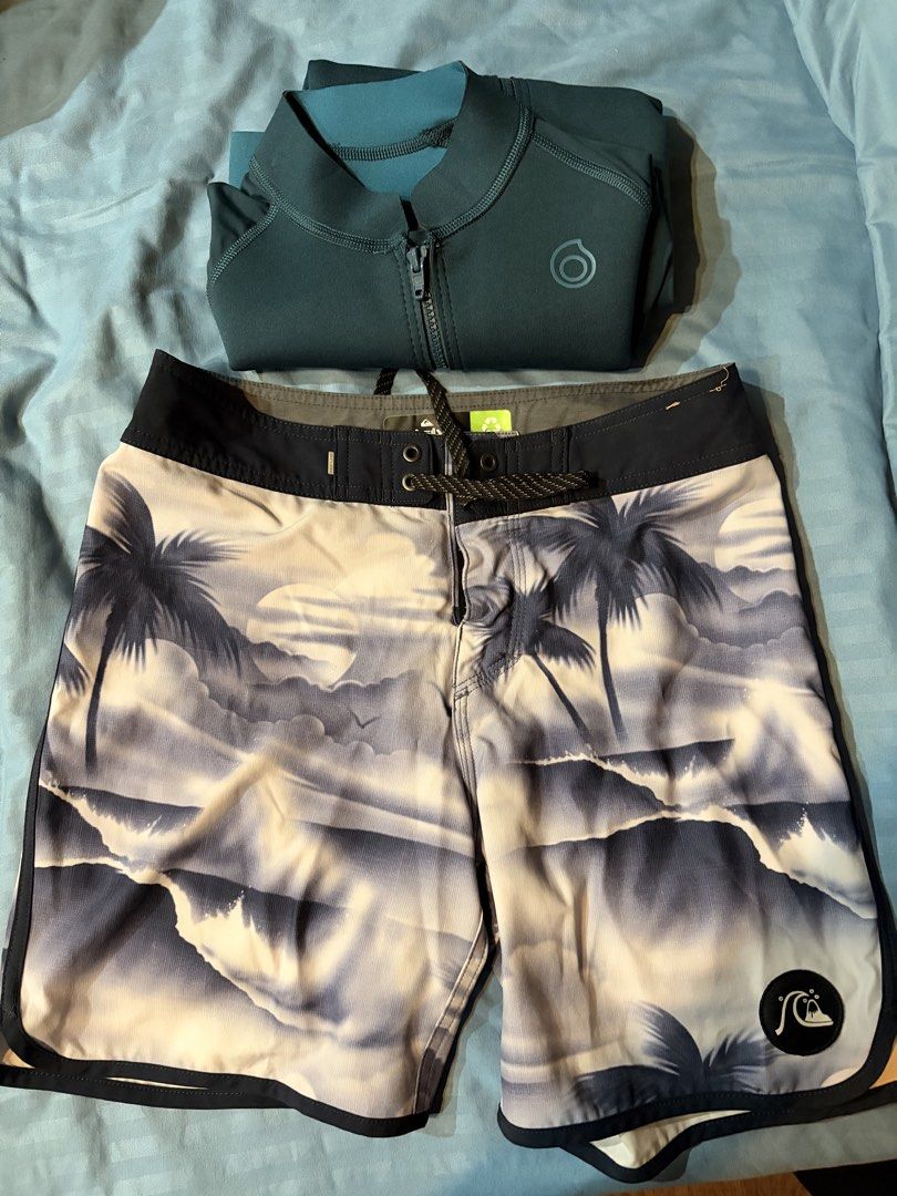 Rashguard & Quicksilver short - As pack! (Category: Activewear) located in Cebu City. Submitted by mltp28 (Listing ID 1451269017, Image 2). Description: 2 pieces for One price!!! - Decathlon Rushguard - Used only once - L: 26 x W:17-18 - Quicksilver boardshorts - Good as new - Size 28, 16” length RFS: Decluterring.