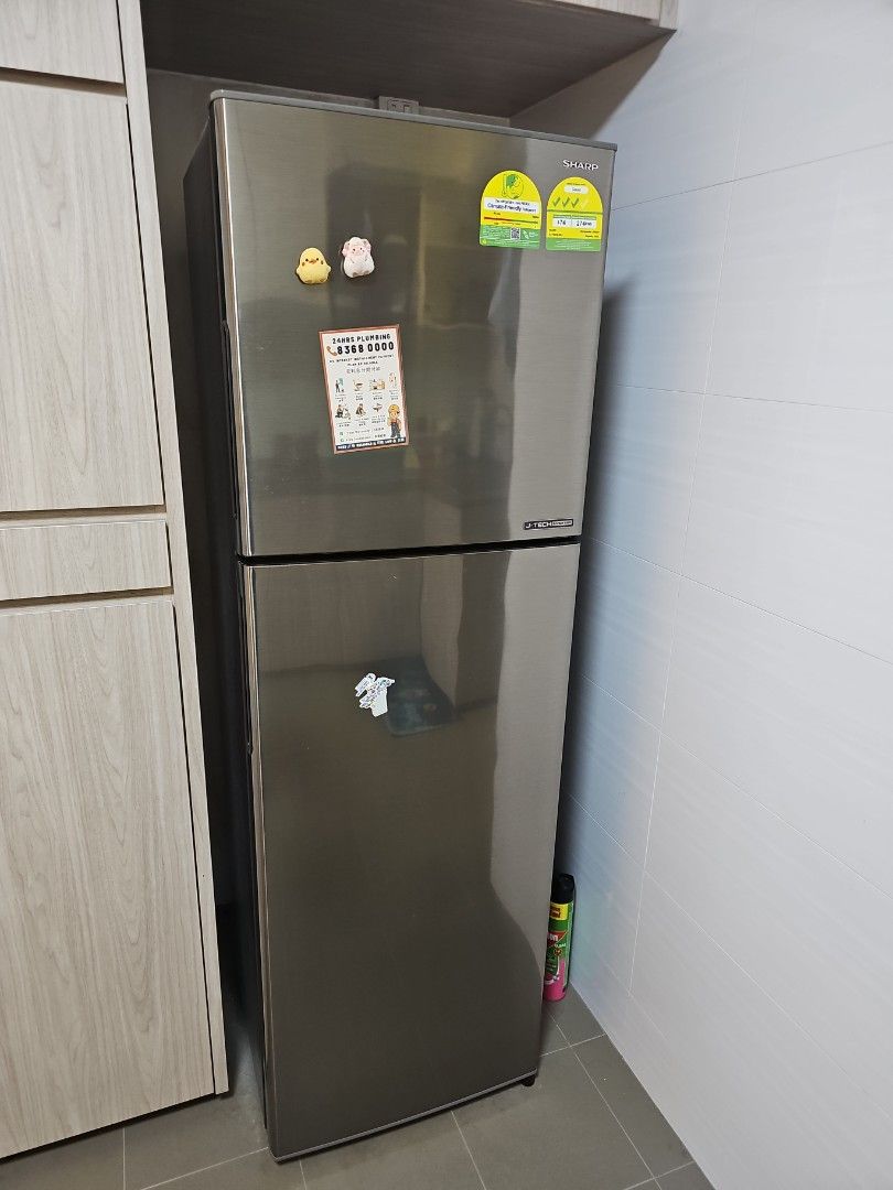 Sharp Refrigerator (Category: Refrigerators & Freezers) located in Singapore. Submitted by skyriderx (Listing ID 1451270876, Image 1). Description: - Sharp Refrigerator - Stainless Steel Finish - Two Doors (Top Freezer) - Energy Efficient - Works Well - Selling due to relocation - 3 years old.