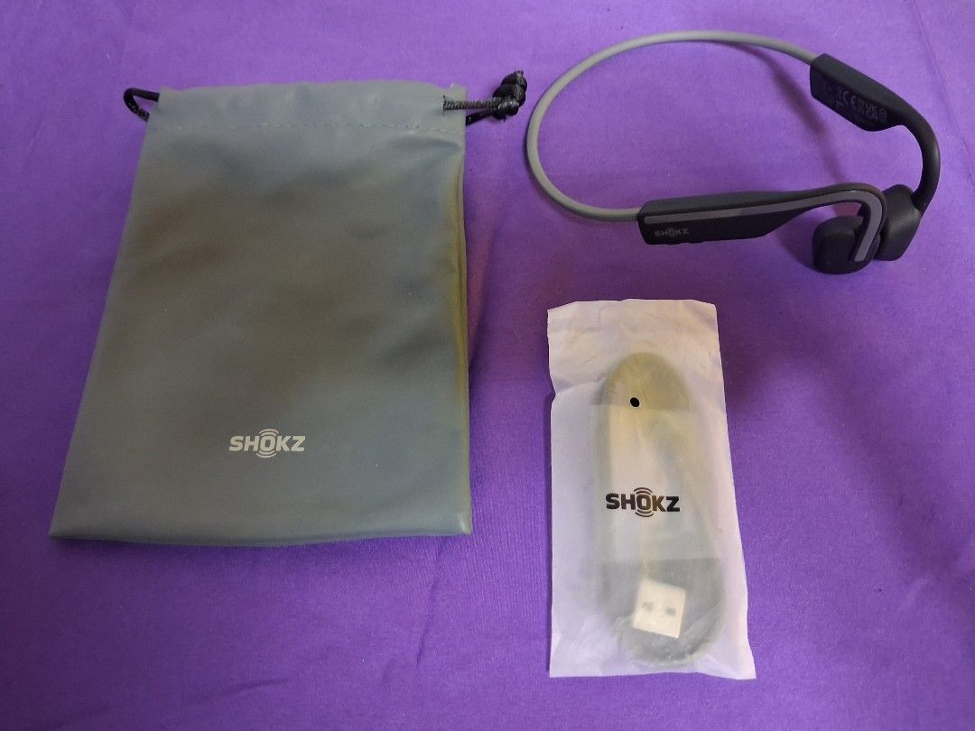 Shokz Openmove Bone Conduction (Category: Headphones & Headsets) located in Makati City. Submitted by alexshhah84730 (Listing ID 1451132317, Image 1). Description: - Issue: Natanggal sa pagkadikit ung cover ng charging pero nakakabit pa rin - Includes grey carrying pouch - Includes USB charging cable RFS: Done jogging era LAST PRICE.