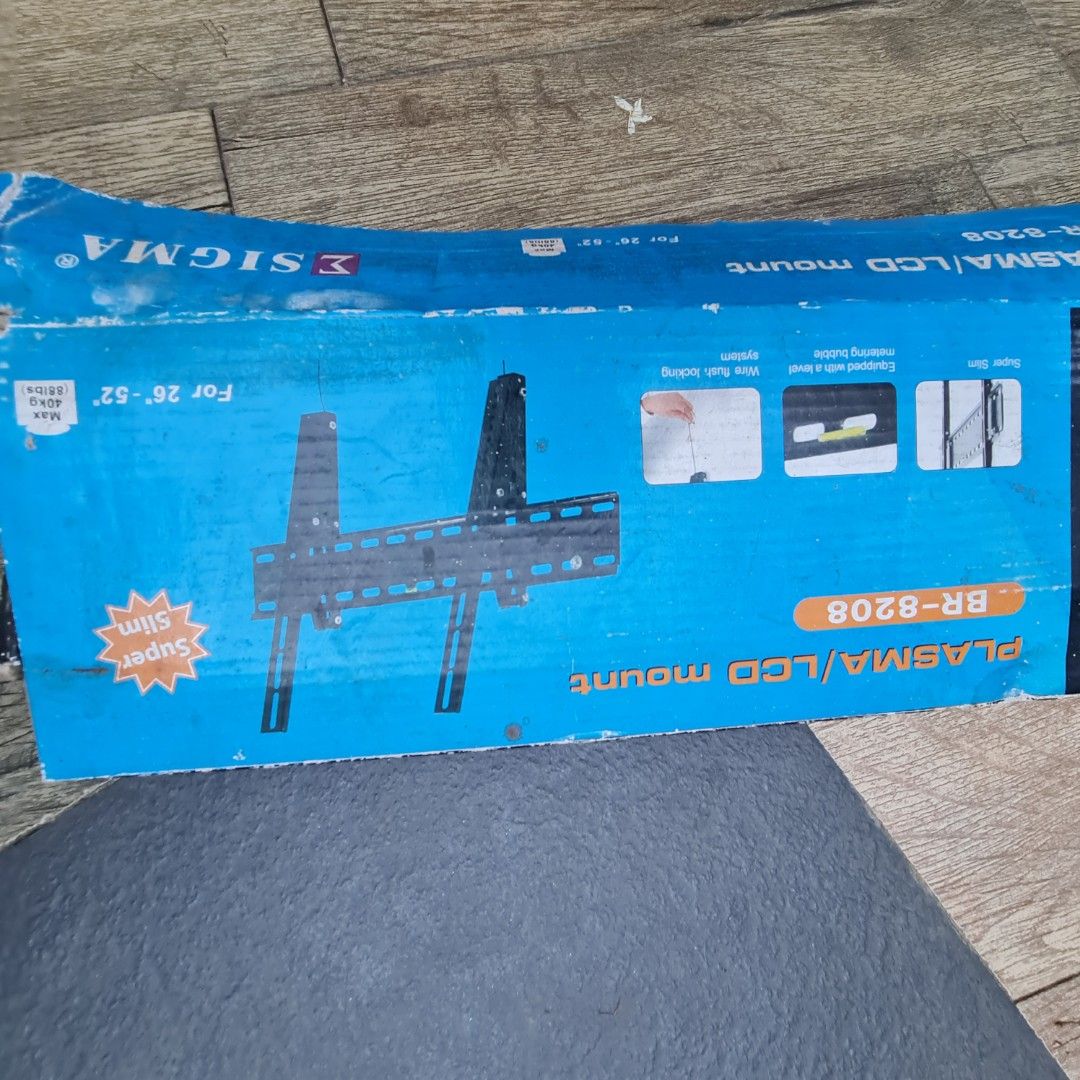 Sigma BR-8208 Tilting TV Wall Mount Bracket (26" – 52") (Category: TV Parts & Accessories) located in Guiguinto. Submitted by heart143214 (Listing ID 1451261205, Image 2). Description: Brand: Sigma Model: BR-8208 Condition: Like New / Complete Set (Includes original box, mounting plate with built-in bubble level, dual arms, and complete set of screws/wall plugs) ​Key Features: ​TV Size Compatibility: Fits 26" to 52" LCD / LED / Plasma TVs ​Max We