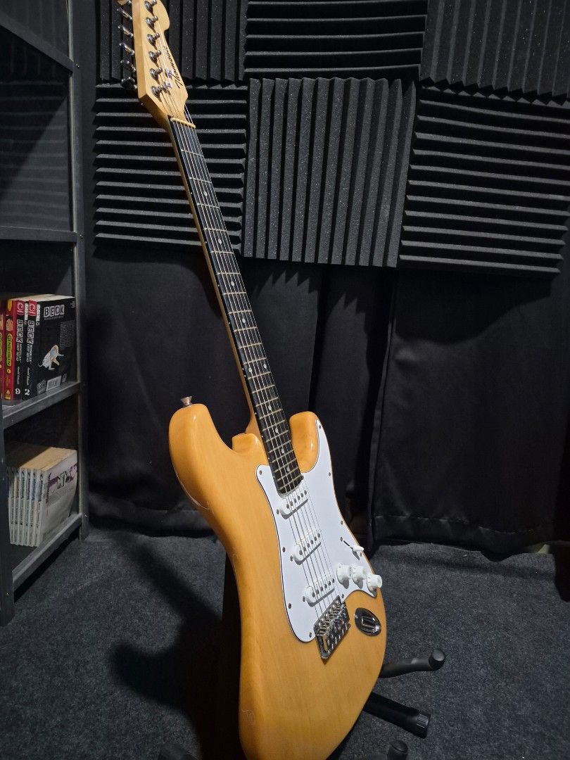 Stratocaster (ST1 Series) - Natural Finish (Category: Musical Instruments) located in Antipolo. Submitted by psycho_ocean (Listing ID 1451299594, Image 3). Description: Specification: *Body: Solid ash wood *Neck: Maple *Fingerboard: Rosewood *Frets: 22 *Pickups: S-S-S (Single-coil) *Controls: 1 volume, 2 tones, and 3-way/ 5-way switch *Bridge: 2-pivot tremolo bridge *Scale length: 25½"(648mm) *Hardware: Die-cast machine heads The following are in
