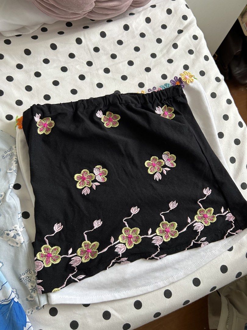 Summer Floral Tube Top and Halter Bundle Set (Category: Sets or Coordinates) located in Pasig City. Submitted by declutterwithme_agb (Listing ID 1451215510, Image 3). Description: - Bundle includes 3 tops and 1 skirt. - Light blue floral halter top. - White tube top with colorful flower trim. - Black tube skirt with embroidered flowers. - Blue and white floral print top. - Ideal for creating versatile summer outfits..