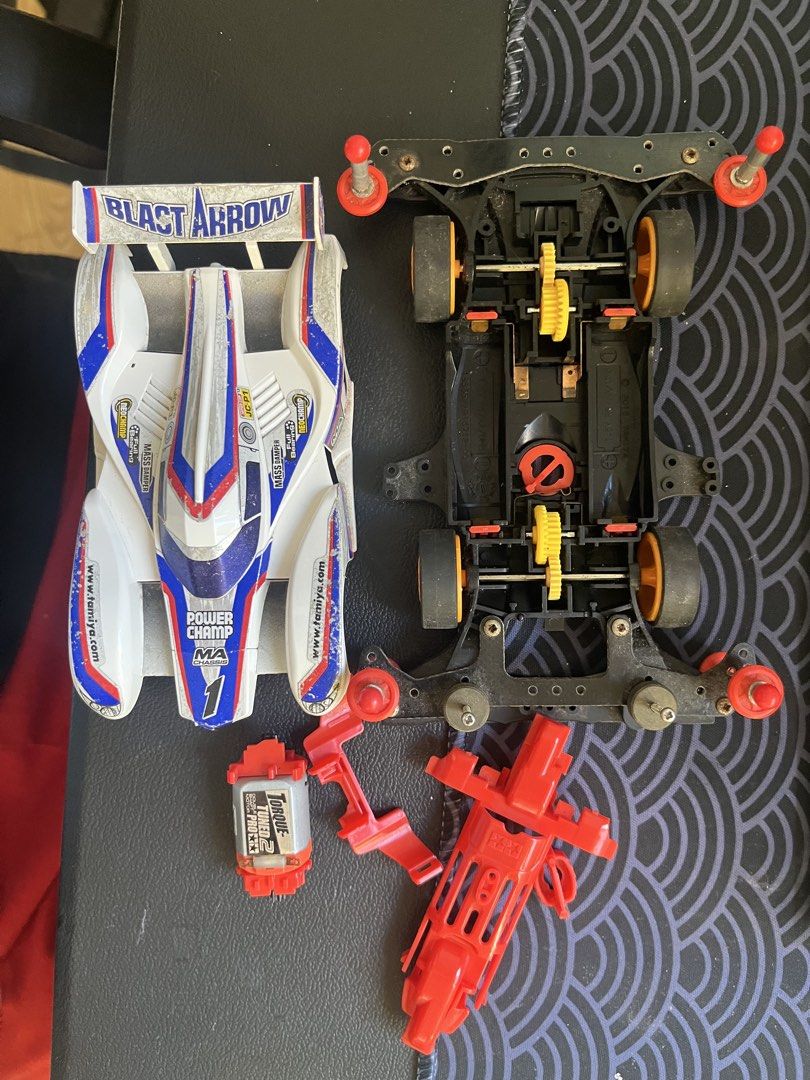 Tamiya Mini 4WD Blast Arrow MA Power Champ (Category: Remote Control Toys) located in Santa Rosa. Submitted by juugalilim19414 (Listing ID 1451207384, Image 1). Description: Havent used it sa tracks. Naka stock lang assembled only havent raced it. - Tamiya Mini 4WD Blast Arrow - MA Power Champ version - Includes chassis, body, and motor - Comes with extra red parts - Body has some dust - Perfect for collectors and hobbyists - Ready for building o