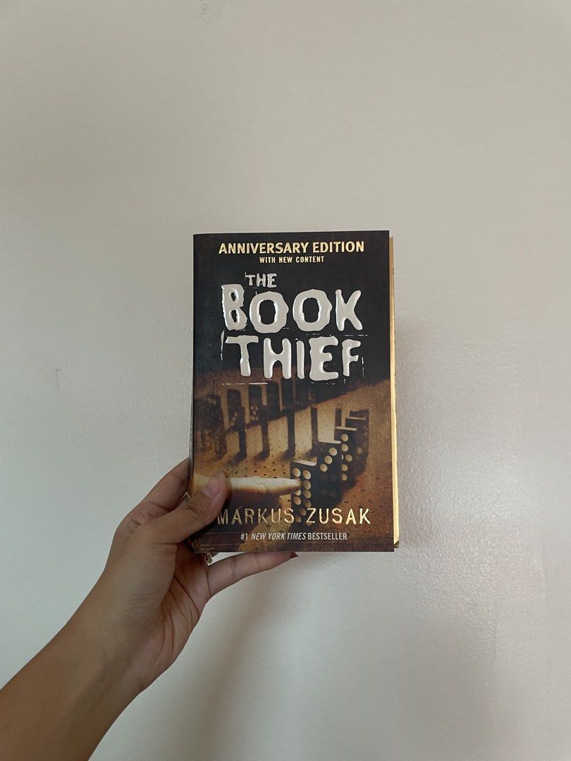 The Book Thief by Markus Zusak (Category: Storybooks) located in Manila. Submitted by declutteredbyalex (Listing ID 1451278895, Image 2). Description: - Bought in Fullybooked; Authentic copy - Has minimal foxing but won’t affect your reading experience - No book tabs, annotations, or writings RFS: Decluttering/Quitting P.S. If you buy 2 books from my listings, you will receive 1 free book 😊.