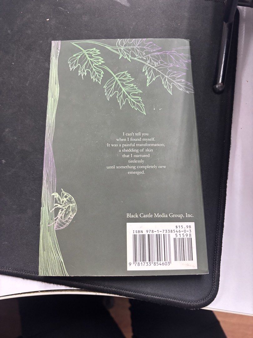 The Evolution of a Girl by L.E. Bowman (Category: Storybooks) located in Dasmarinas. Submitted by elle0914 (Listing ID 1451172803, Image 2). Description: - Book Title: The Evolution of a Girl - Author: L.E. Bowman - Publisher: Black Castle Media Group, Inc. - Cover Design: Features a cicada and leaf motif - Back Cover: Includes a poem about transformation - Original Price: $15.98.