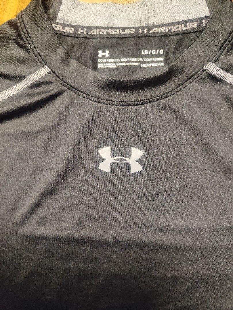 UNDER ARMOUR Compression Shirt (Category: Activewear) located in Zamboanga. Submitted by hirayangbuwan (Listing ID 1451157024, Image 2). Description: L: 68 cm W: 46 cm Under Amour Compression Shirt No damages, tears, or stains Original / Authentic Black Color MOP: Gcash/ Bank Transfer MOD: J&T / LBC.