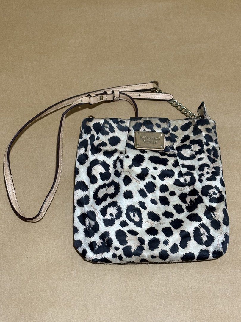 Leopard Victoria Secret Body Bag (Category: Cross-body Bags) located in Cavite. Submitted by wardrobelooped (Listing ID 1451147370, Image 1). Description: Victoria Secret Body bag - Have slight flaws on the strap - Needs cleaning - Guaranteed Original - Price is still negotiable - SF will be shouldered by the buyer - PM for more details and inquiries .