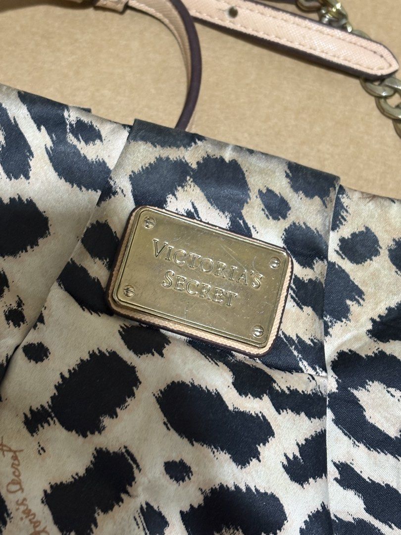 Leopard Victoria Secret Body Bag (Category: Cross-body Bags) located in Cavite. Submitted by wardrobelooped (Listing ID 1451147370, Image 2). Description: Victoria Secret Body bag - Have slight flaws on the strap - Needs cleaning - Guaranteed Original - Price is still negotiable - SF will be shouldered by the buyer - PM for more details and inquiries .