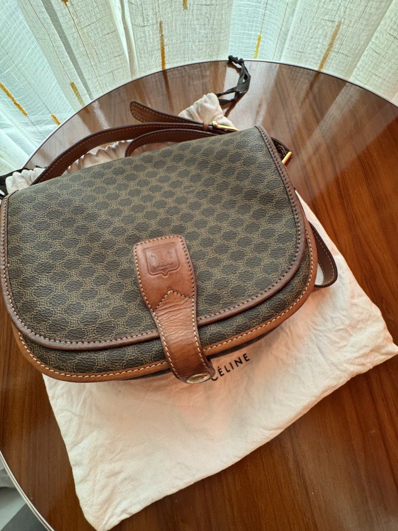Vintage Celine Macadam Shoulder Bag (Category: Luxury Bags & Wallets) located in Manila. Submitted by raewiee7 (Listing ID 1451284660, Image 1). Description: - Iconic Celine Macadam print shoulder bag - Classic brown and tan colorway - Genuine leather trim and strap - Features an interior zip pocket - Comes with original dust bag - A timeless and versatile accessory.