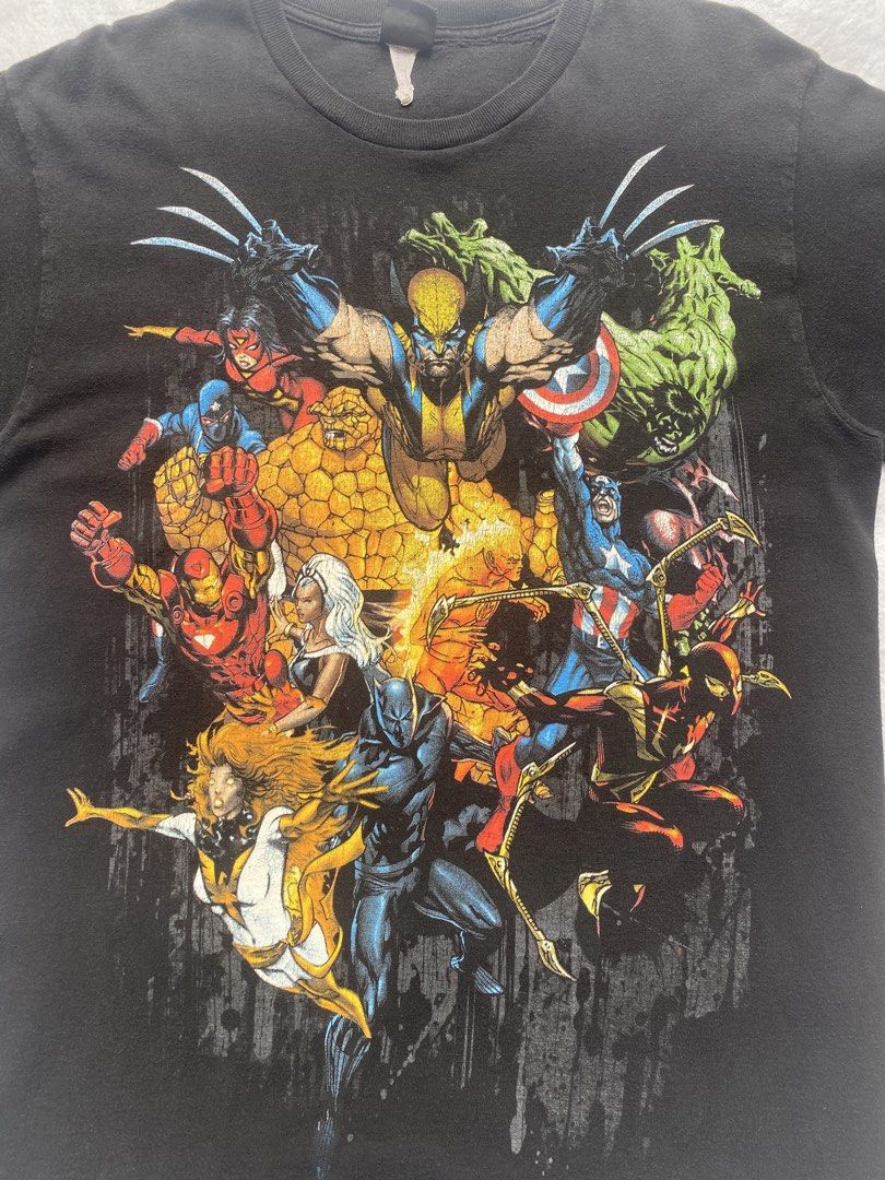 Vintage Marvels Mad Engine Collage Character (Category: Tshirts & Polo Shirts ) located in Dasmarinas. Submitted by ridgeridethrift (Listing ID 1451263427, Image 3). Description: vintage Mad Engine Marvel Heroes graphic tee featuring a collage of characters. Measurements: Width Chest - 22 Length Top to Bottom - 30 Item Description: Have repair, crack prints, minor lints 4000+ shipping fee Dm to purchase 📥.