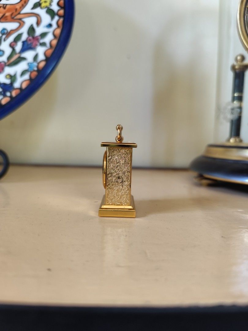 Vintage Miniature Gold-Plated Carriage Clock (Category: Clocks) located in Davao. Submitted by papa1919 (Listing ID 1451190675, Image 2). Description: Clock has quartz mechanism that runs on an ordinary round watch battery cell. In very good running and cosmetic condition..