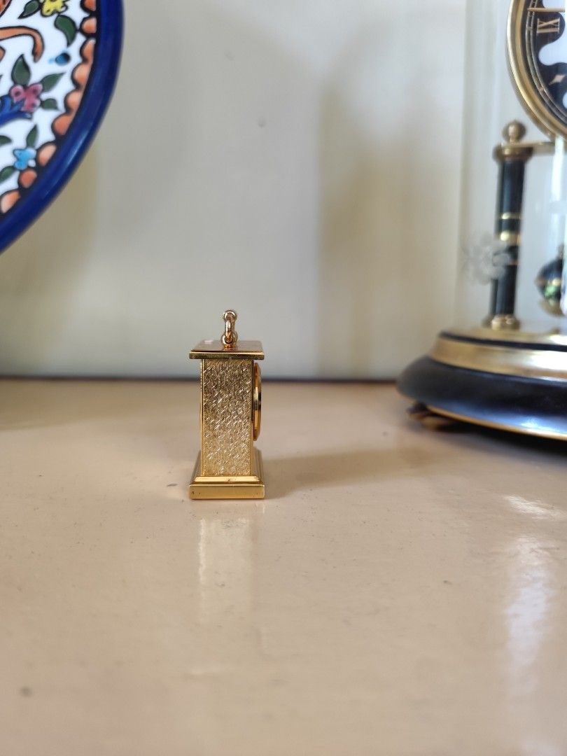 Vintage Miniature Gold-Plated Carriage Clock (Category: Clocks) located in Davao. Submitted by papa1919 (Listing ID 1451190675, Image 3). Description: Clock has quartz mechanism that runs on an ordinary round watch battery cell. In very good running and cosmetic condition..