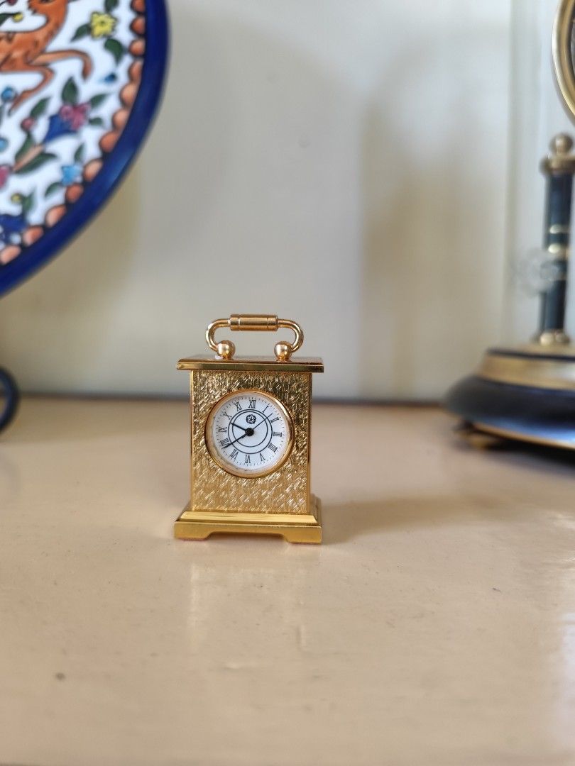 Vintage Miniature Gold-Plated Carriage Clock (Category: Clocks) located in Davao. Submitted by papa1919 (Listing ID 1451190675, Image 1). Description: Clock has quartz mechanism that runs on an ordinary round watch battery cell. In very good running and cosmetic condition..