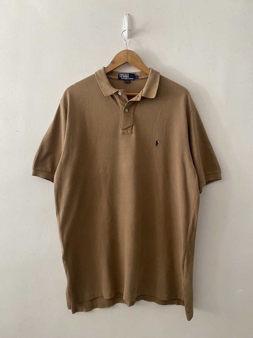 Vintage Ralph Lauren Cafe Tan Basic Logo Polo Shirt (Category: Tshirts & Polo Shirts ) located in Quezon City. Submitted by rlphvncntbs (Listing ID 1451279462, Image 1). Description: Vintage Ralph Lauren Cafe Tan Basic Logo Polo Shirt Size: Large Measurements: 23" x 31" (Front Length), 32" (Back Length) Flaws: 1 Pinhole (Back of Left Sleeve) Excellent Condition ₱1,800 + SF (Negotiable).