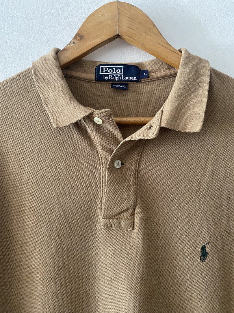 Vintage Ralph Lauren Cafe Tan Basic Logo Polo Shirt (Category: Tshirts & Polo Shirts ) located in Quezon City. Submitted by rlphvncntbs (Listing ID 1451279462, Image 2). Description: Vintage Ralph Lauren Cafe Tan Basic Logo Polo Shirt Size: Large Measurements: 23" x 31" (Front Length), 32" (Back Length) Flaws: 1 Pinhole (Back of Left Sleeve) Excellent Condition ₱1,800 + SF (Negotiable).