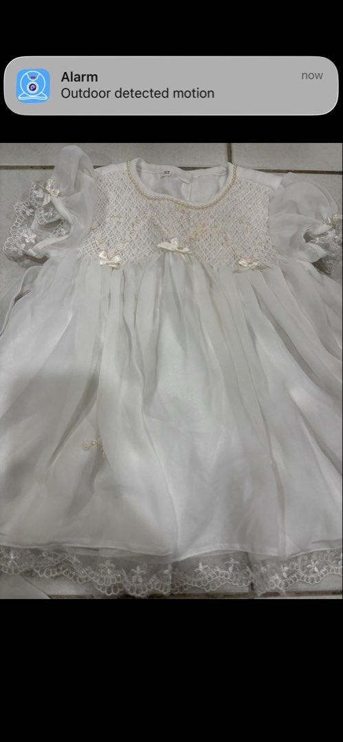 White Christening Gown Baby Girl Lace Pearls (Category: Babies & Kids Fashion) located in Puchong. Submitted by raralara (Listing ID 1451155226, Image 3). Description: - Beautiful white baby dress - Delicate lace and pearl details on bodice and sleeves - Sheer skirt overlay with lace trim - Includes matching sash - Perfect for special occasions like christenings or weddings.