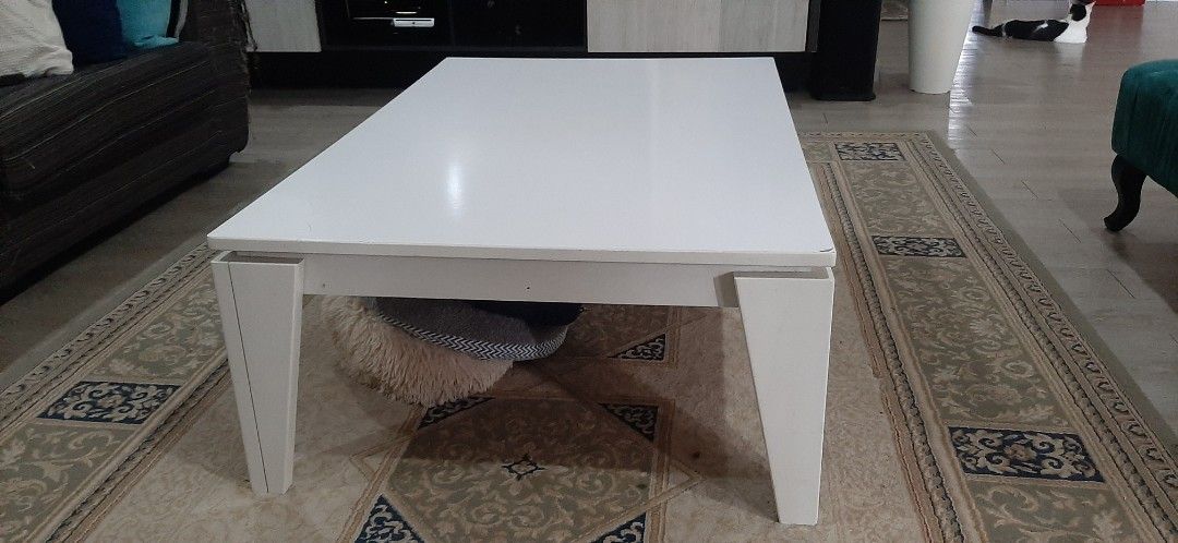 White Rectangular Coffee Table (Category: Tables & Sets) located in Nilai. Submitted by quickphoenix_d29298 (Listing ID 1451315673, Image 2). Description: - Sleek white rectangular coffee table - Modern and simple design - Unique angled legs - Ideal for living room spaces - Dimensions: Approx. 120cm(L)×80cm(W)×40cm(H) - Self Pick up: Nilai/ Selayang or - by lalamove .