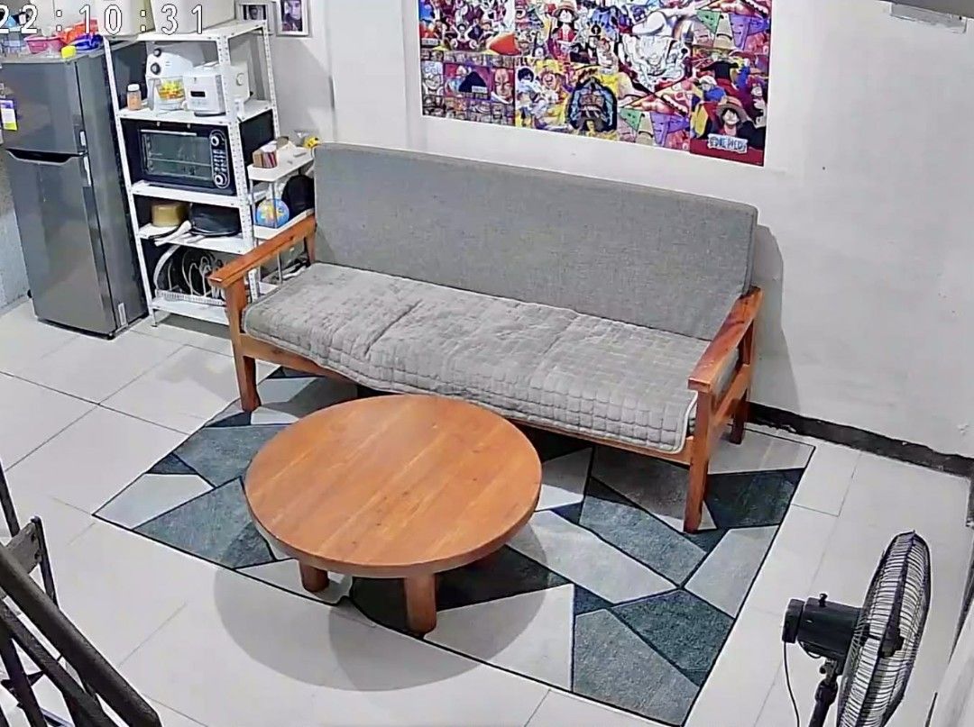 Wooden Sofa with Grey Cushions (Category: Sofas) located in Quezon City. Submitted by delacruzara (Listing ID 1451306227, Image 2). Description: - Comfortable wooden sofa with plush grey cushions. - Includes a matching round wooden coffee table. - Natural wood finish adds a warm, inviting look. - Removable cushion covers for easy cleaning. - Ideal for living rooms or small spaces. - Perfect for relaxing or hosting guests. - Pick up only..
