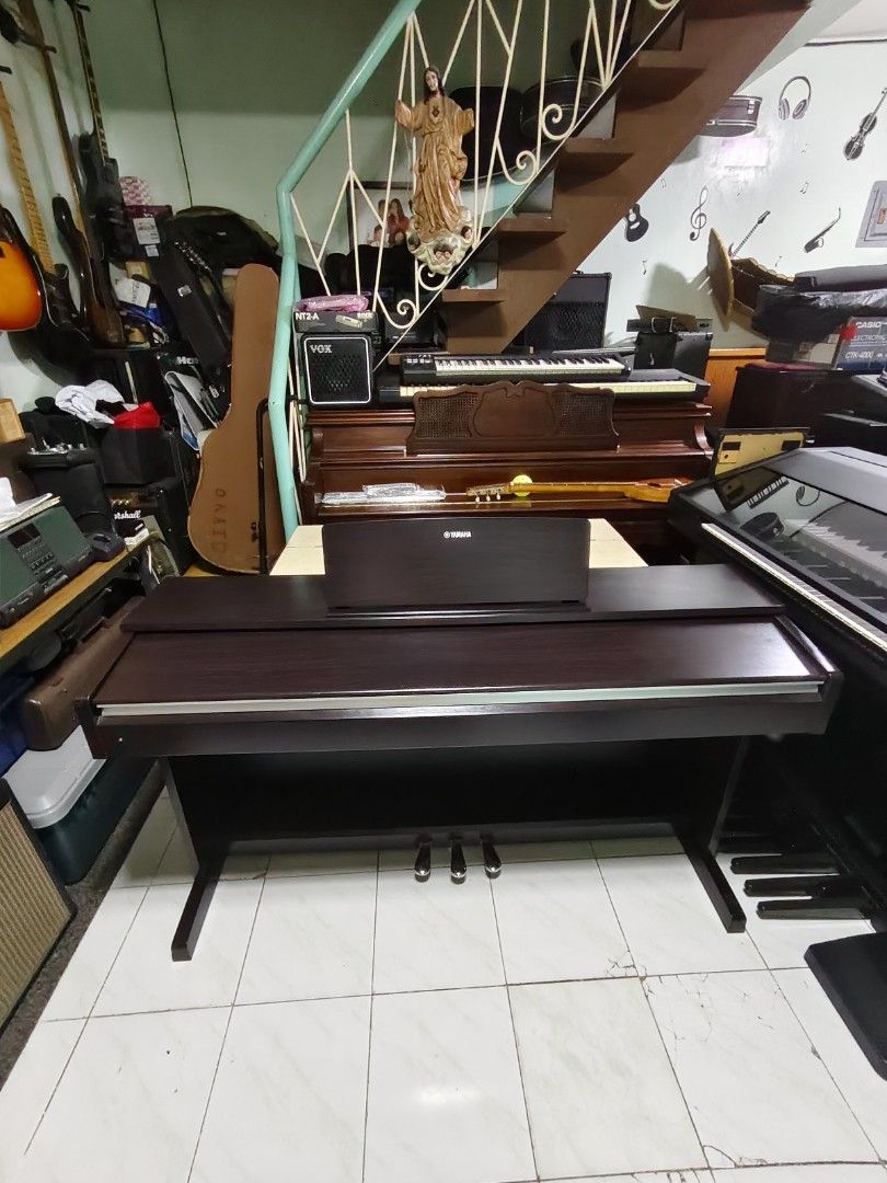 Yamaha Arius ydp142 digital piano (Category: Musical Instruments) located in Paranaque City. Submitted by yourhonorvoy (Listing ID 1451173984, Image 2). Description: Yamaha Arius ydp142 digital piano 40k only With adapter(220v) plug n play With bench With minimal scratches only 😃 Fresh internal Bagong linis at check ang internal With parts available sa keys in case may masira (free) Ideal sa may small space(condo, room etc) For intermediate to a